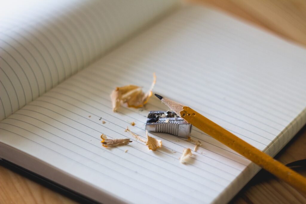 A picture of a pencil having been sharpened.