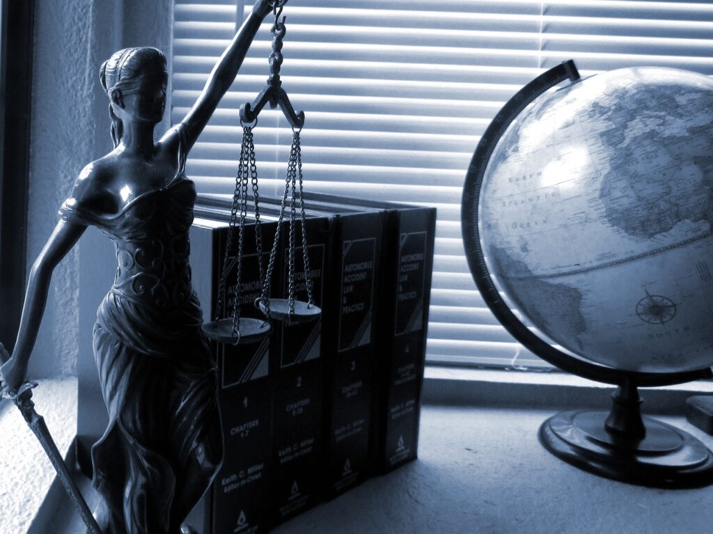 Image of a model of lady justice holding scales