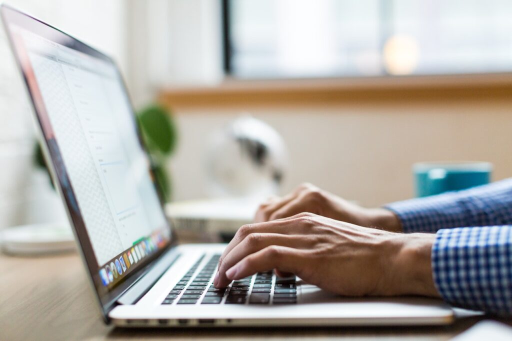 A person using a laptop computer